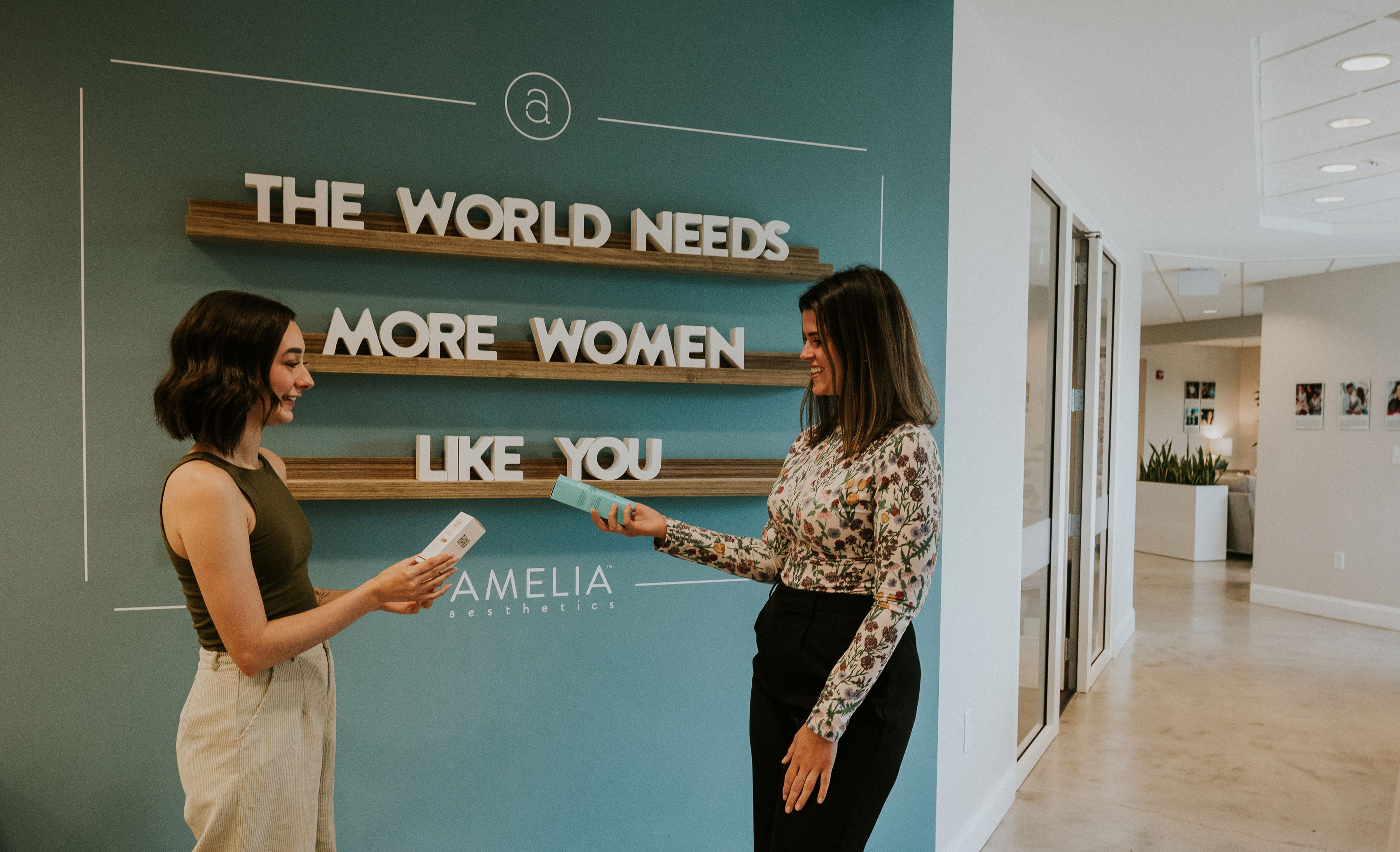 Two women talking in office